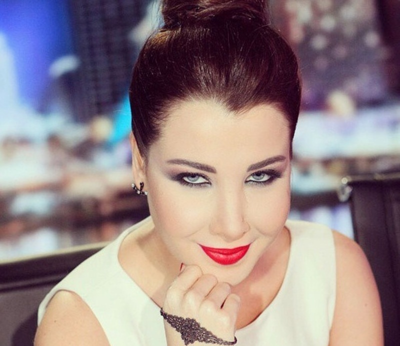 هجرة نانسي عجرم لخارج بلادها وحملها بطفل ذكر!